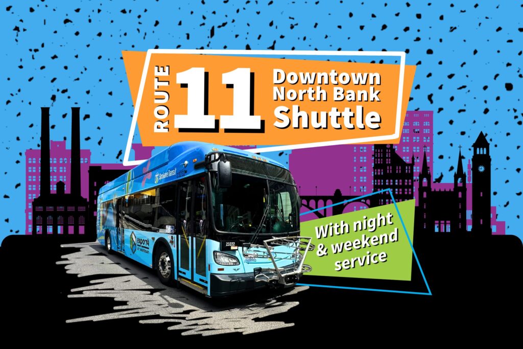 A blue bus on Route 11 with text "Downtown North Bank Shuttle" and "With night & weekend service" on a colorful background.